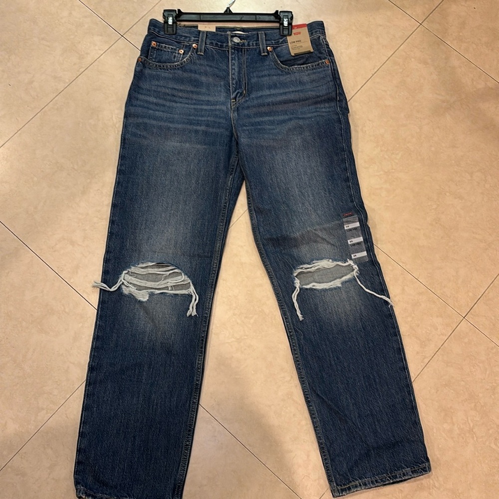 Levi's Women's Low Pro Jeans 
Size 29 inches
Waist 30.2 inches 
Hip 39 inches
